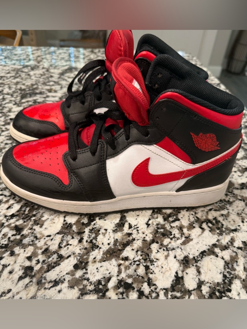 Nike Air Jordan Mid-Top Sneakers in Red and Black